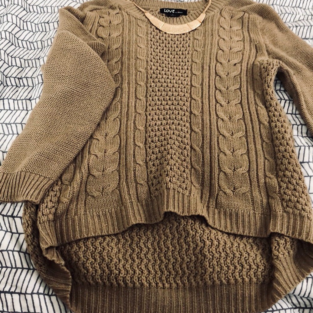 Cable knit, crew neck sweater with extended back!